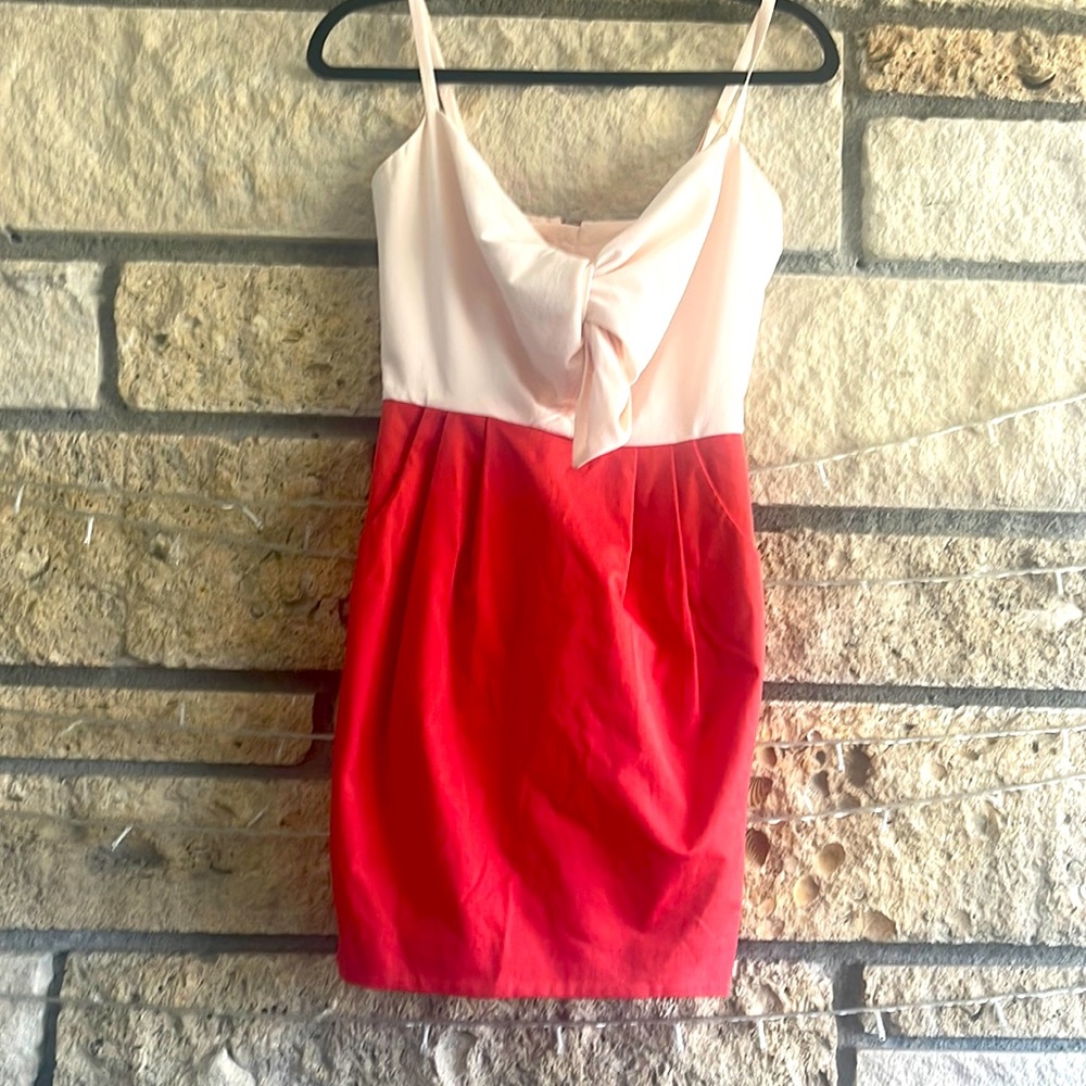 H&M super cute, mini, front bow, dress. Size 2. Made in Turkey.
